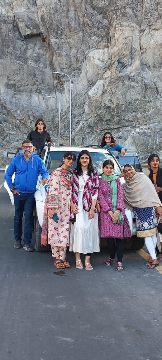 Guests beside their private 4x4 on the Karakoram Highway